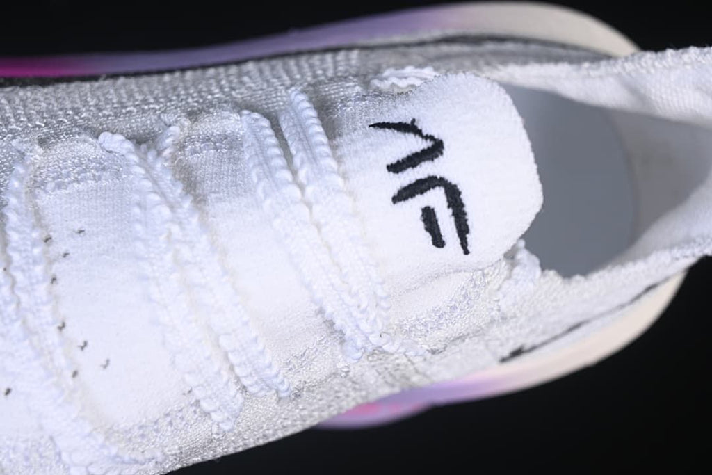 Top-down detail of the laces and white upper.