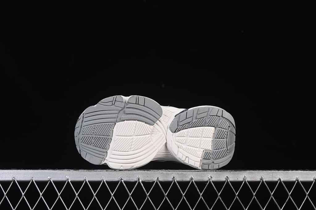 Underside view showing the patterned outsoles