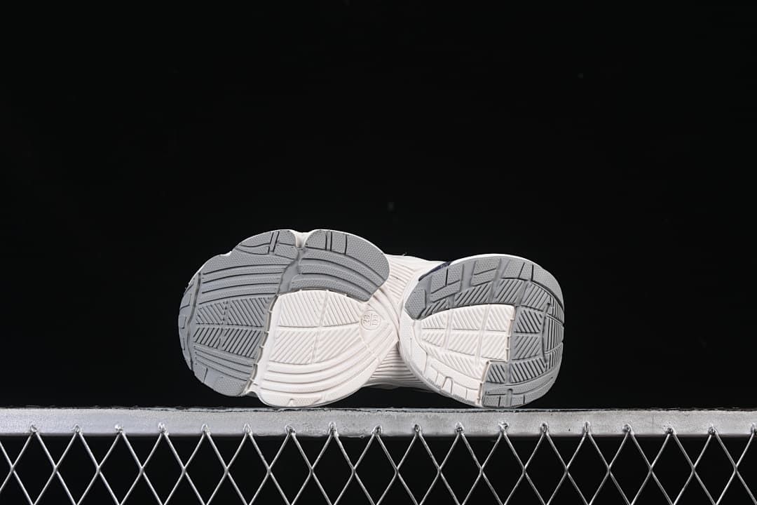 Underside view showing the patterned outsoles
