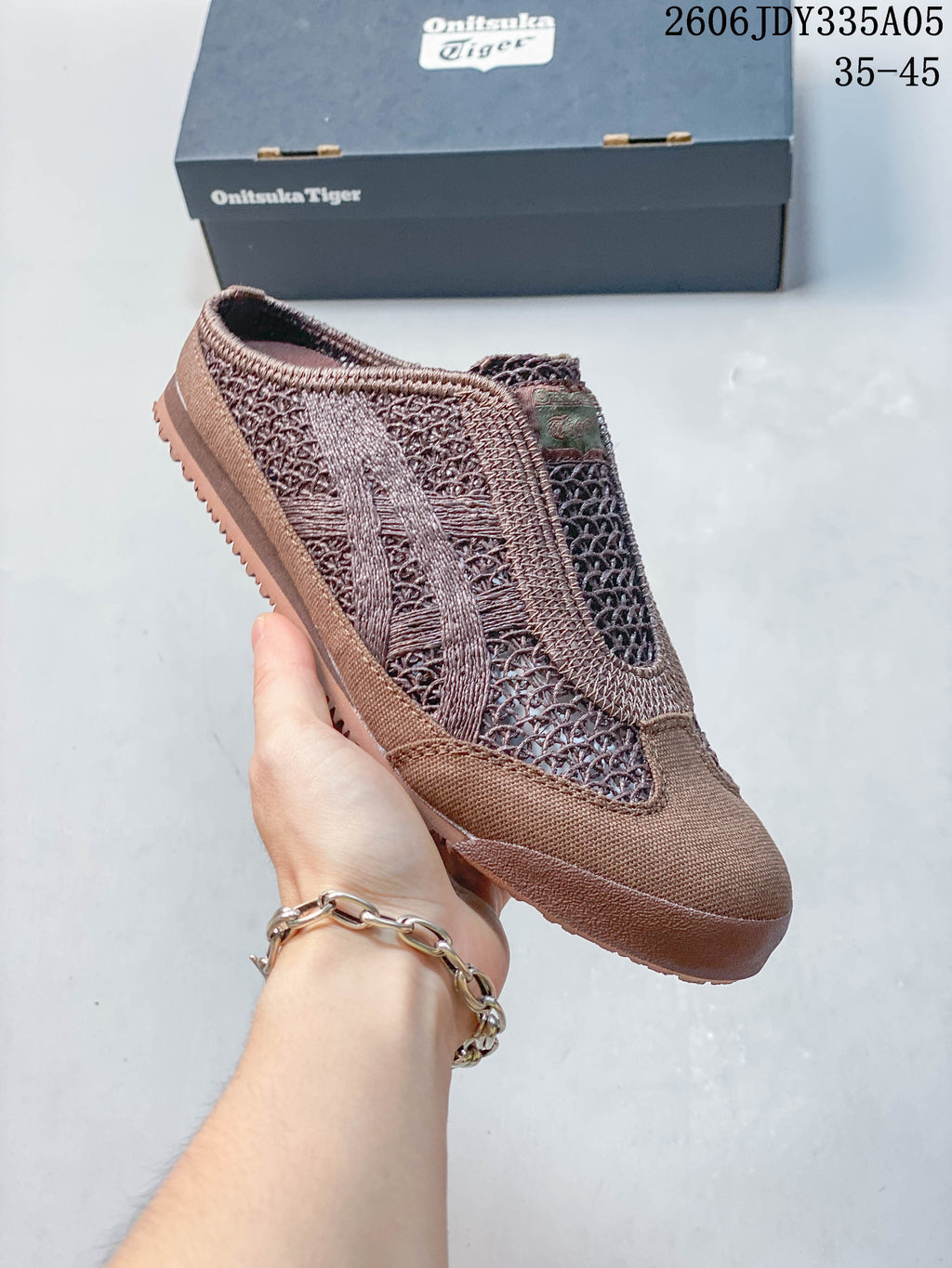 Angled side view of the brown Mexico 66 Sabot shoe