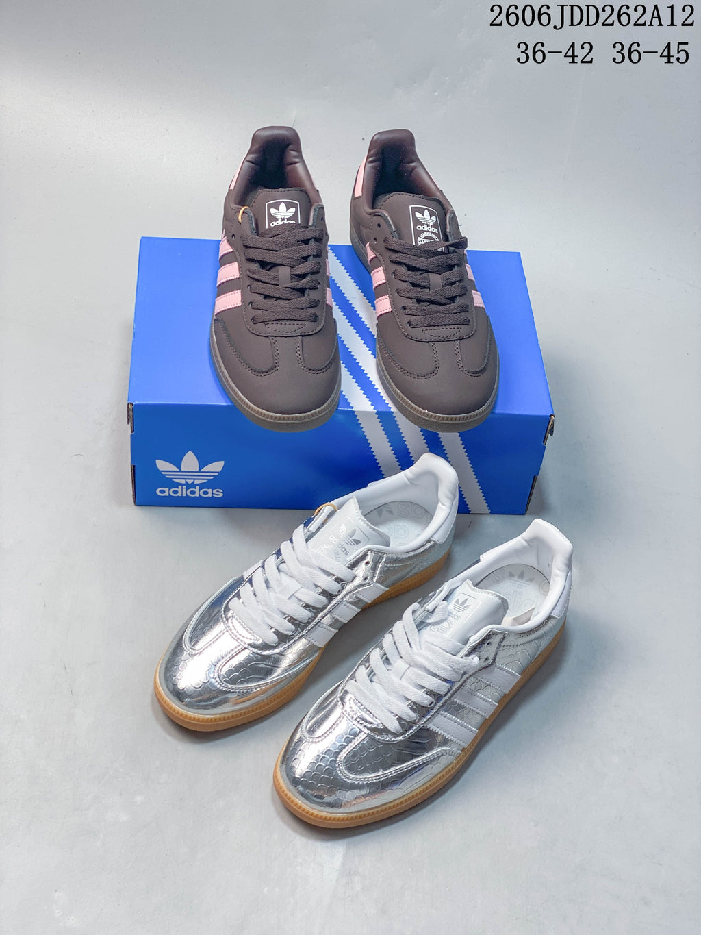Dark brown and pink sneakers displayed above silver sneakers with white stripes.