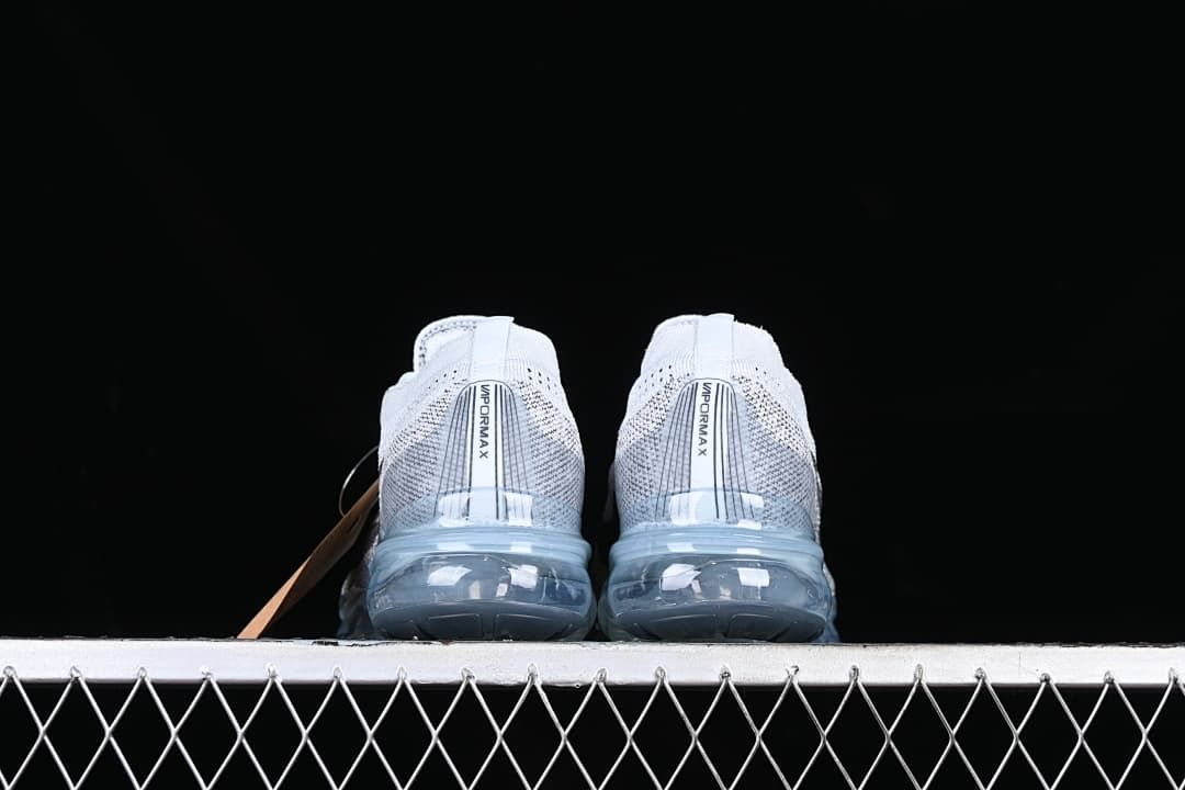 Rear view of the pair showing VaporMax heel details and translucent soles.