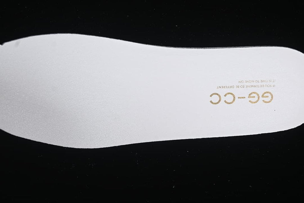Close-up of the insole showing a gold GG-CC marking