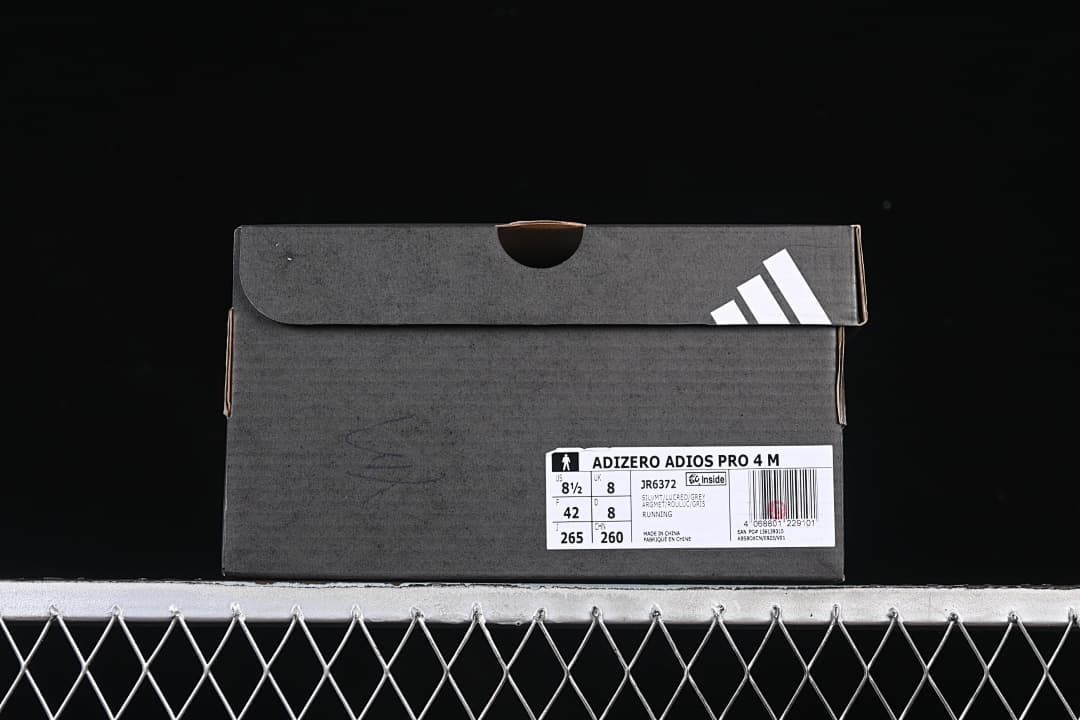 Shoe box label showing Adizero Adios Pro 4 M, JR6372 and sample size information