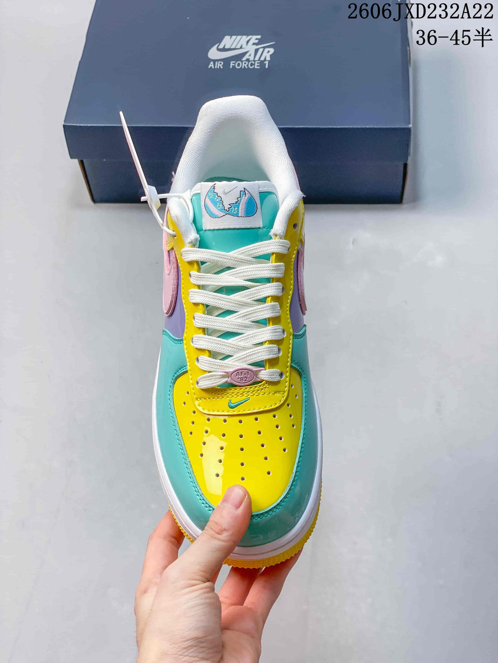 Top view showing the perforated toe, laces, and multicolor design