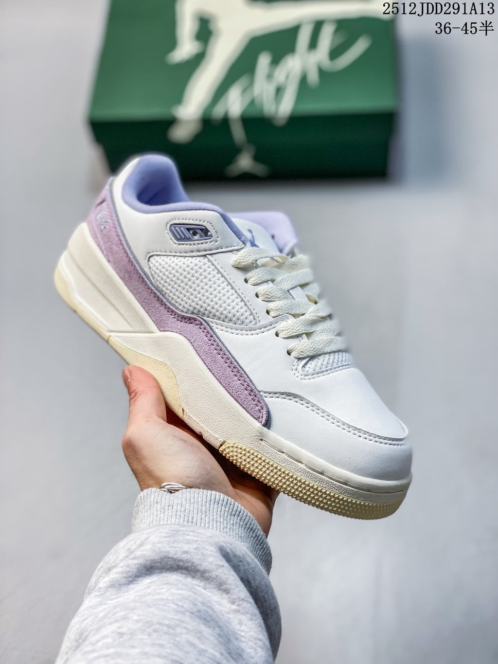 Angled side view of the light-colored sneaker with lavender accents