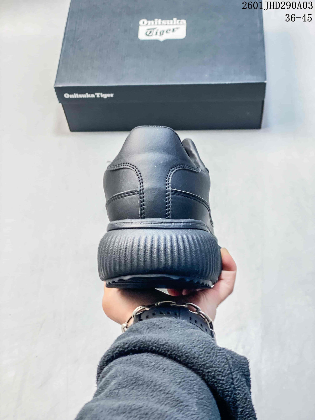 Rear view showing the stitched heel and ribbed sole