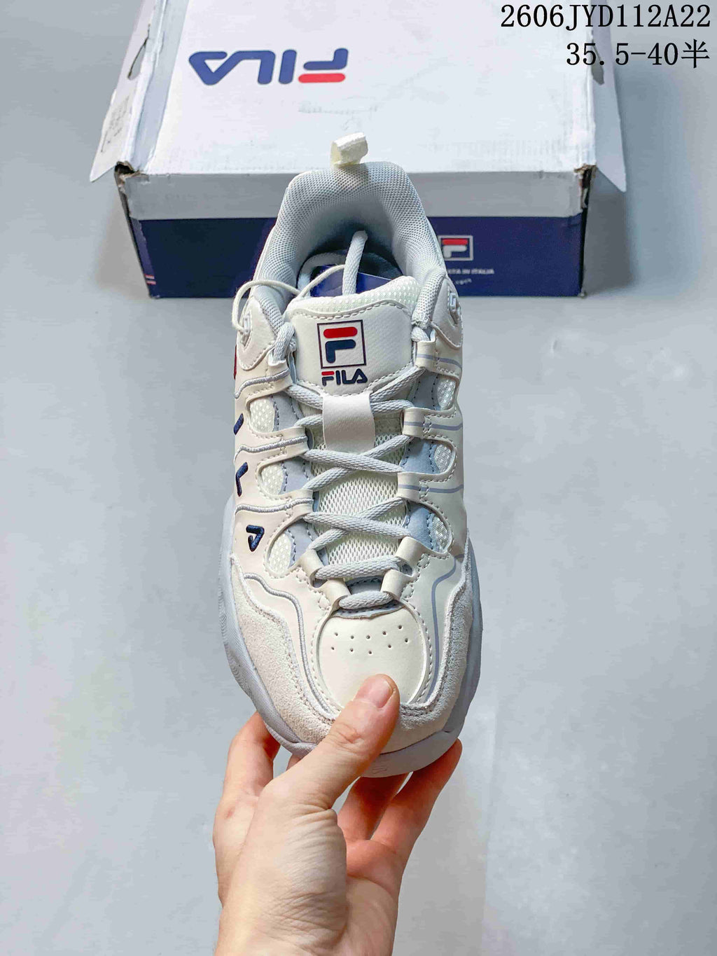 Top view of a white FILA lace-up sneaker