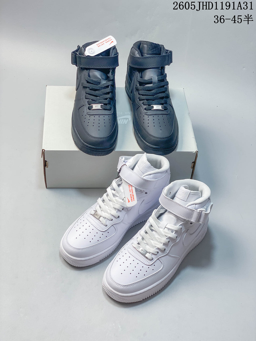 White and dark navy pairs of high-top sneakers shown together