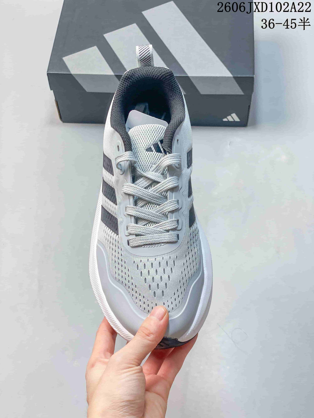 Front view showing the laces and perforated-looking toe area