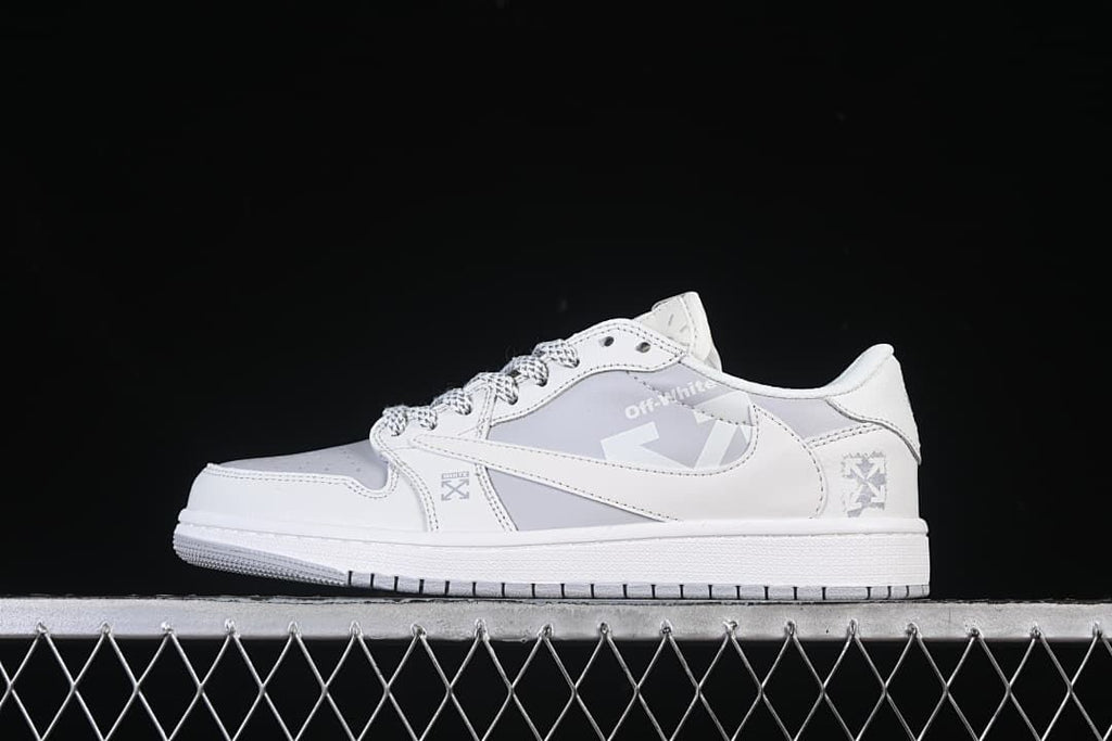 White and light grey low-top sneaker shown from the side against a dark background