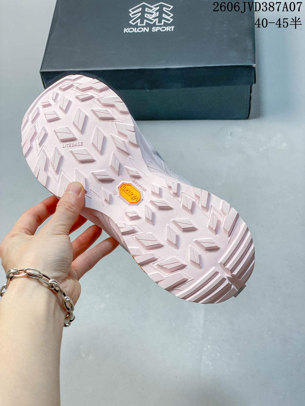 Close-up of the sneaker outsole showing its patterned tread