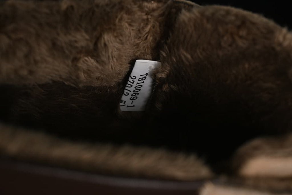 Close-up of the plush boot interior and product label