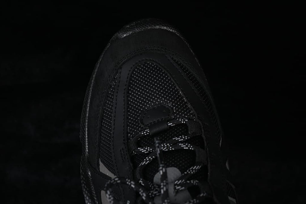 Top view of the black sneaker toe and lacing