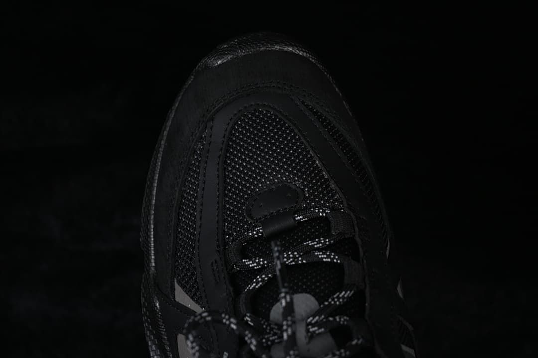 Top view of the black sneaker toe and lacing