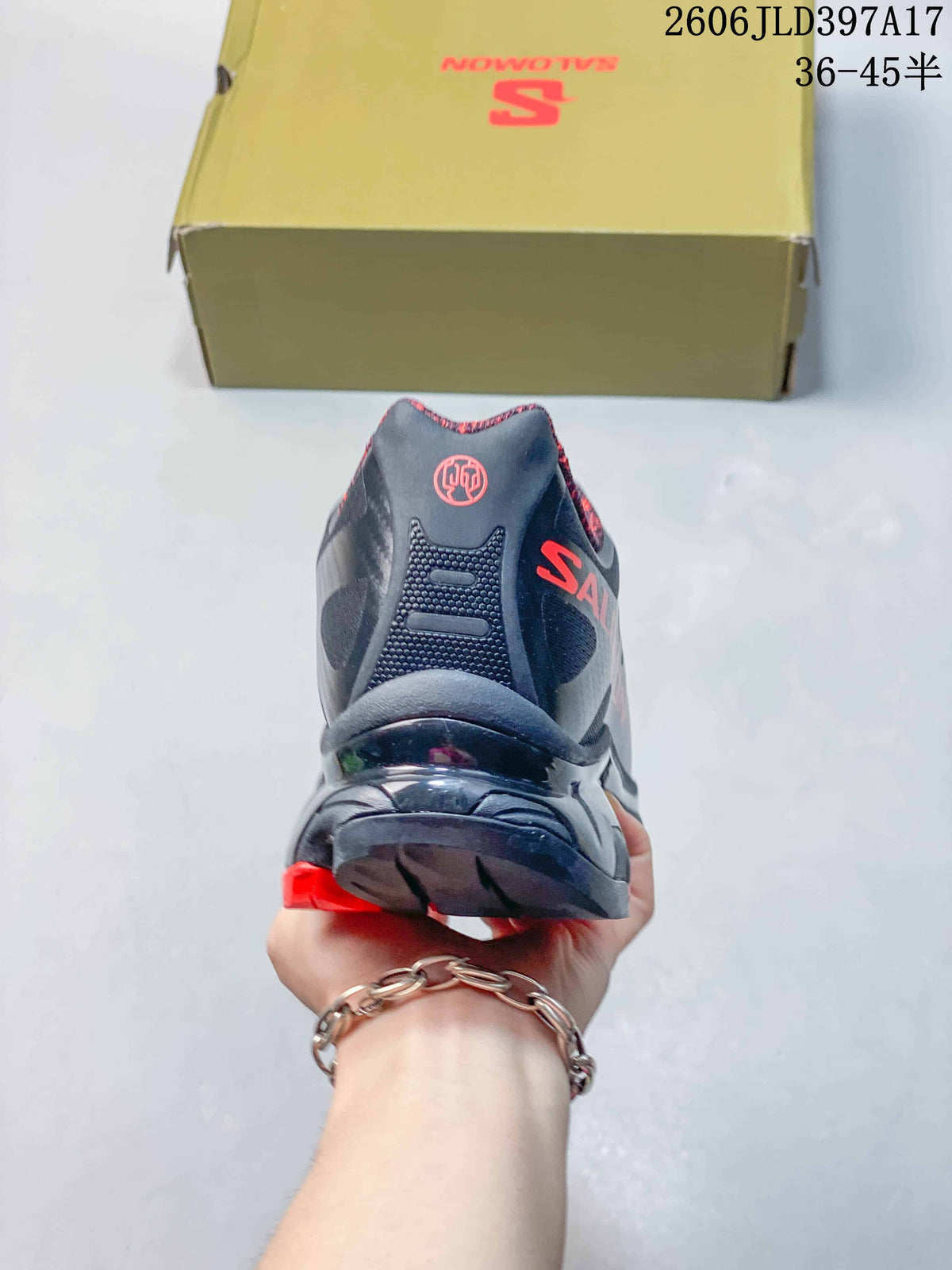 Rear view of the shoe showing its heel design and red branding