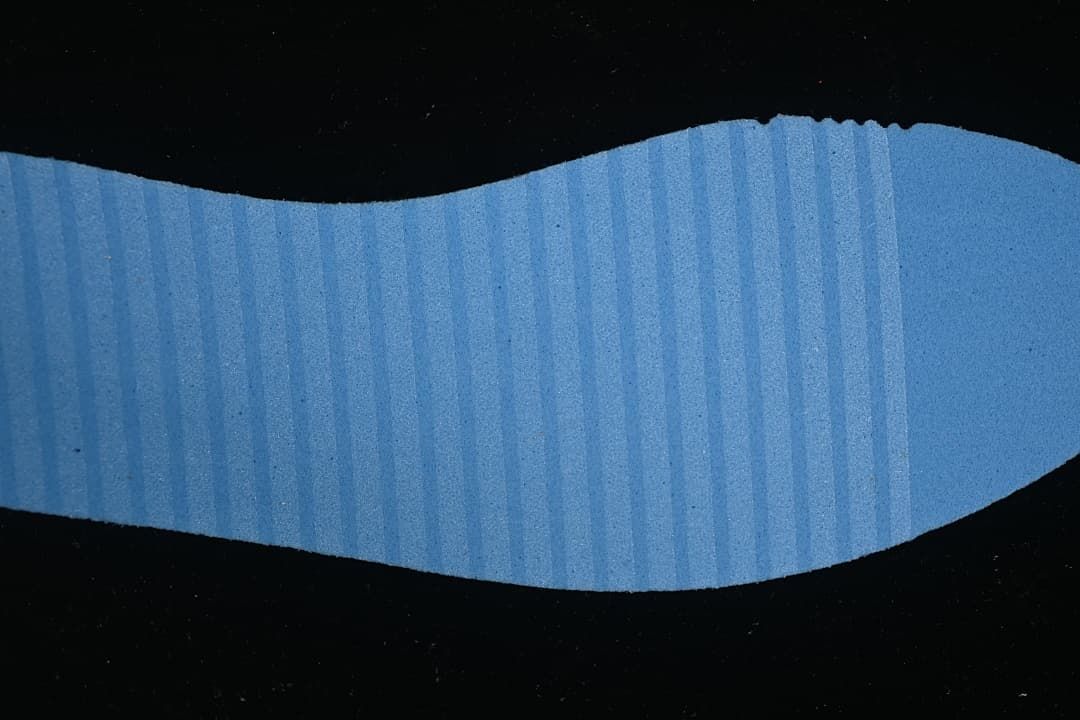 Close-up of the blue ribbed outsole insert