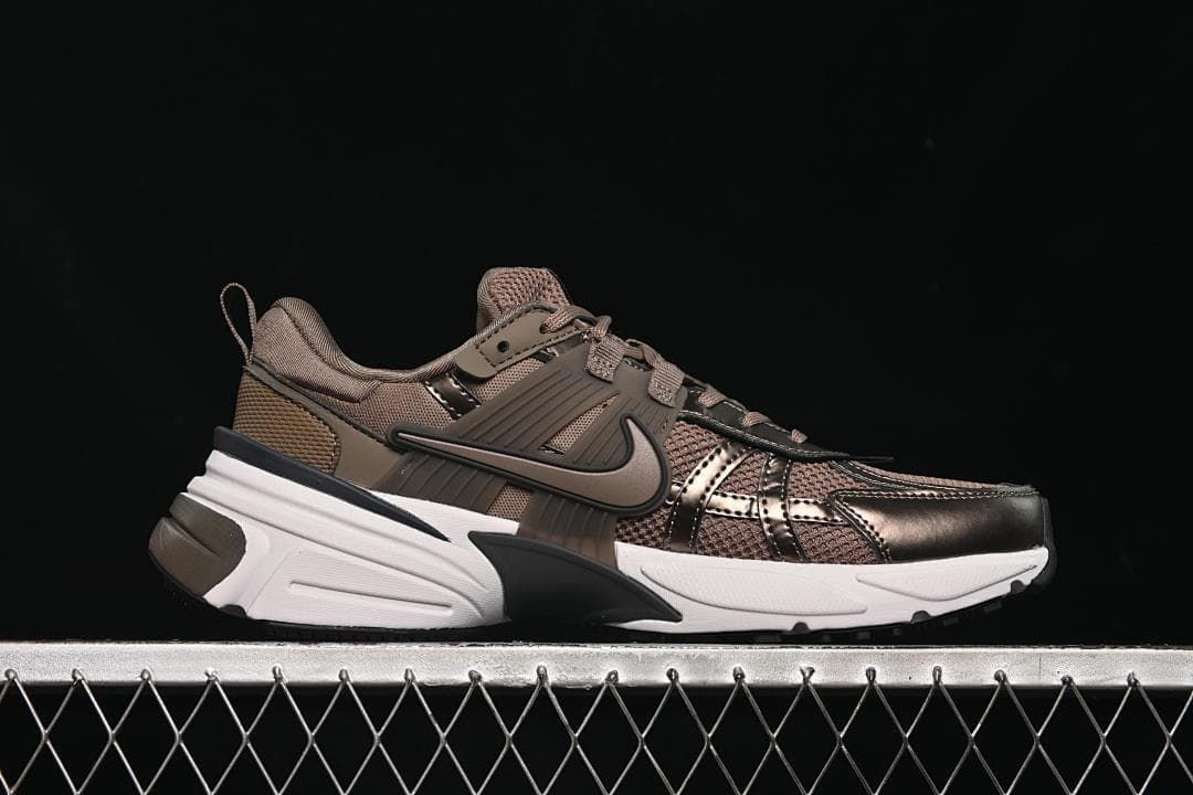 Side profile of a brown Nike V2K Run sneaker with a white midsole