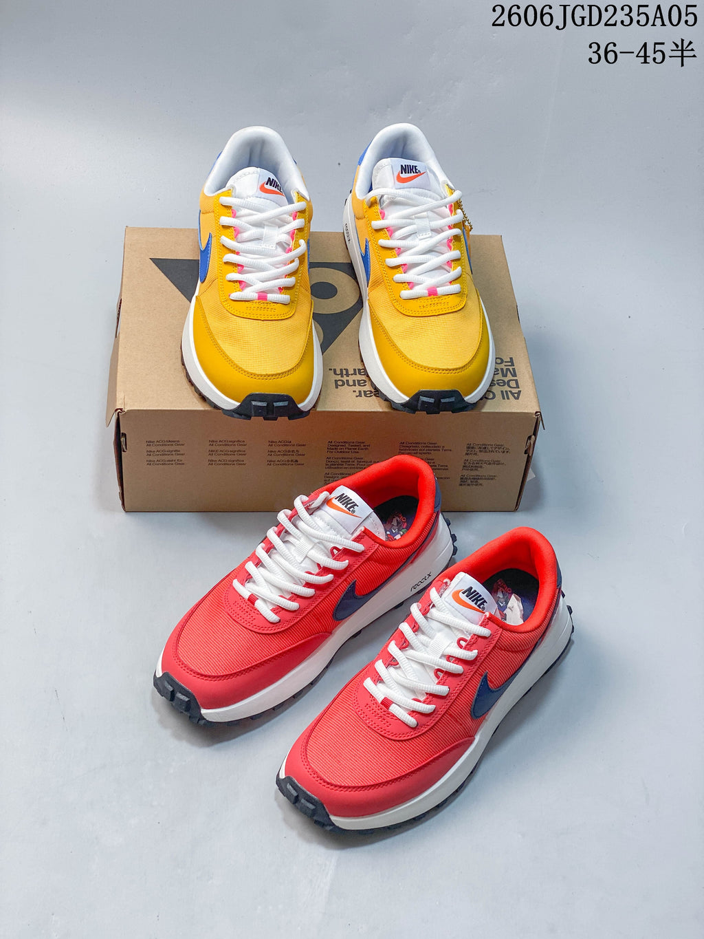 Yellow and red Nike ACG LDV shoes shown together from front and three-quarter angles