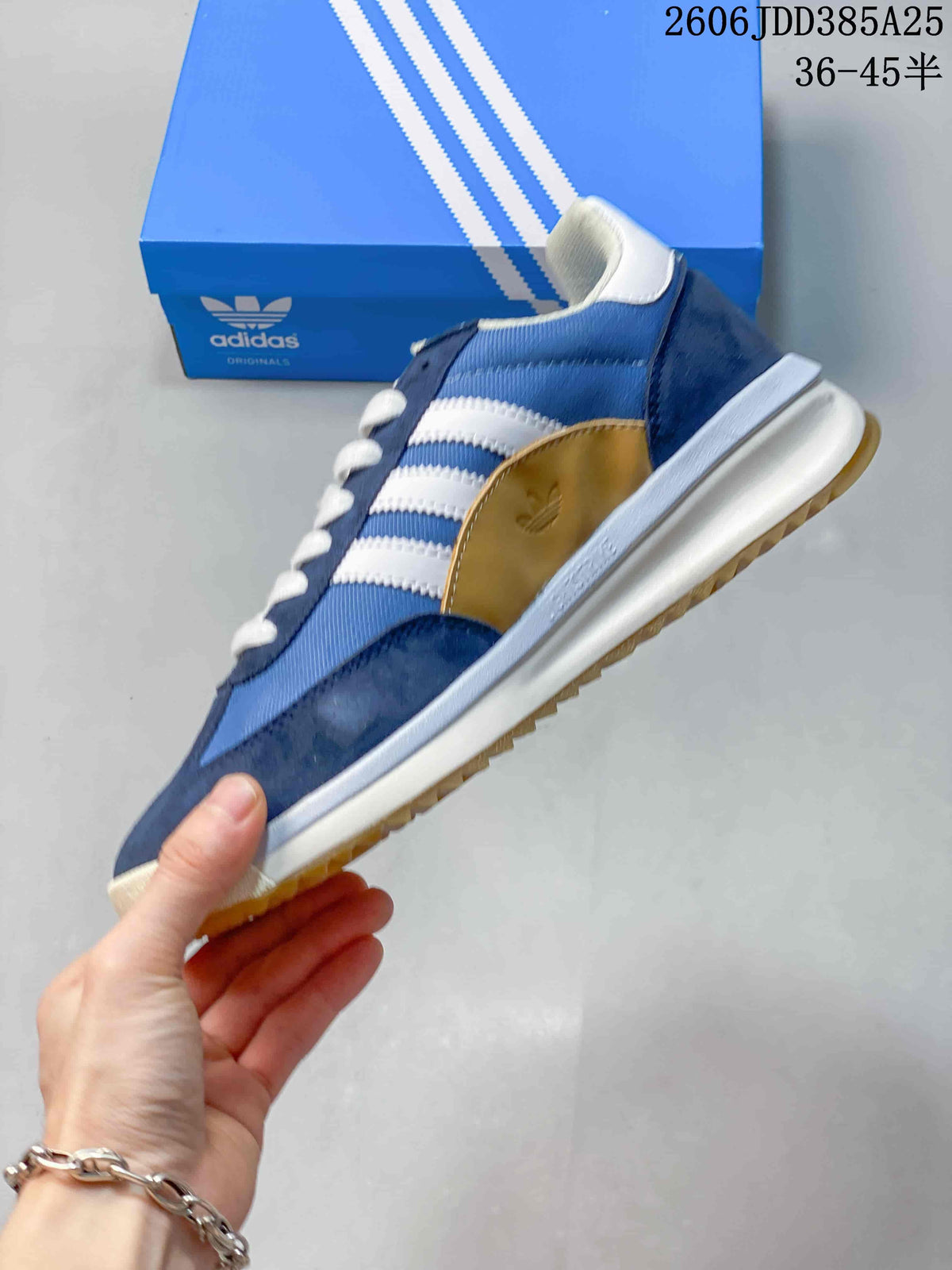 Side view of the blue sneaker with white stripes, navy overlays, and gum outsole.