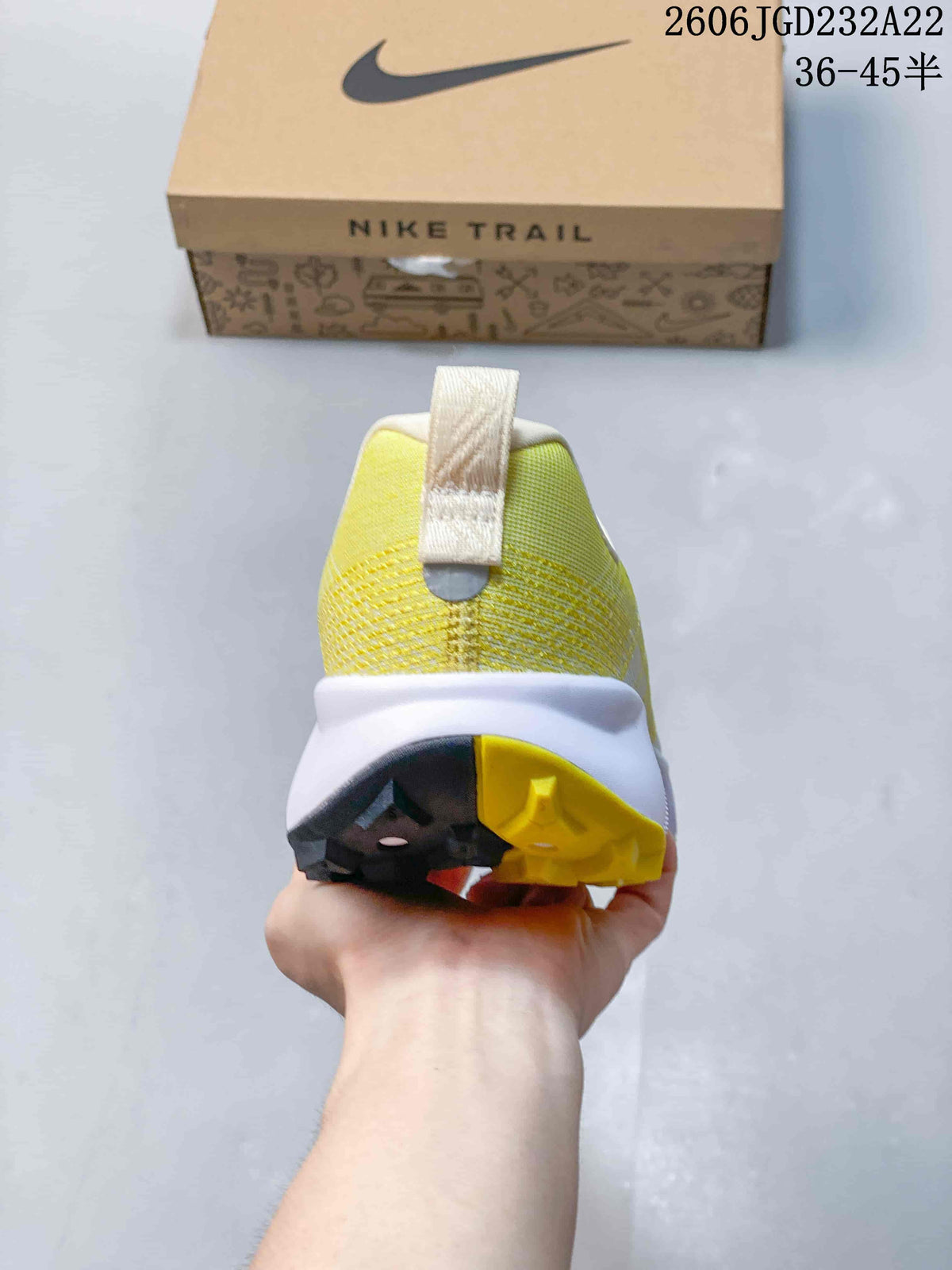 Rear view showing the heel and outsole of the trail running shoe