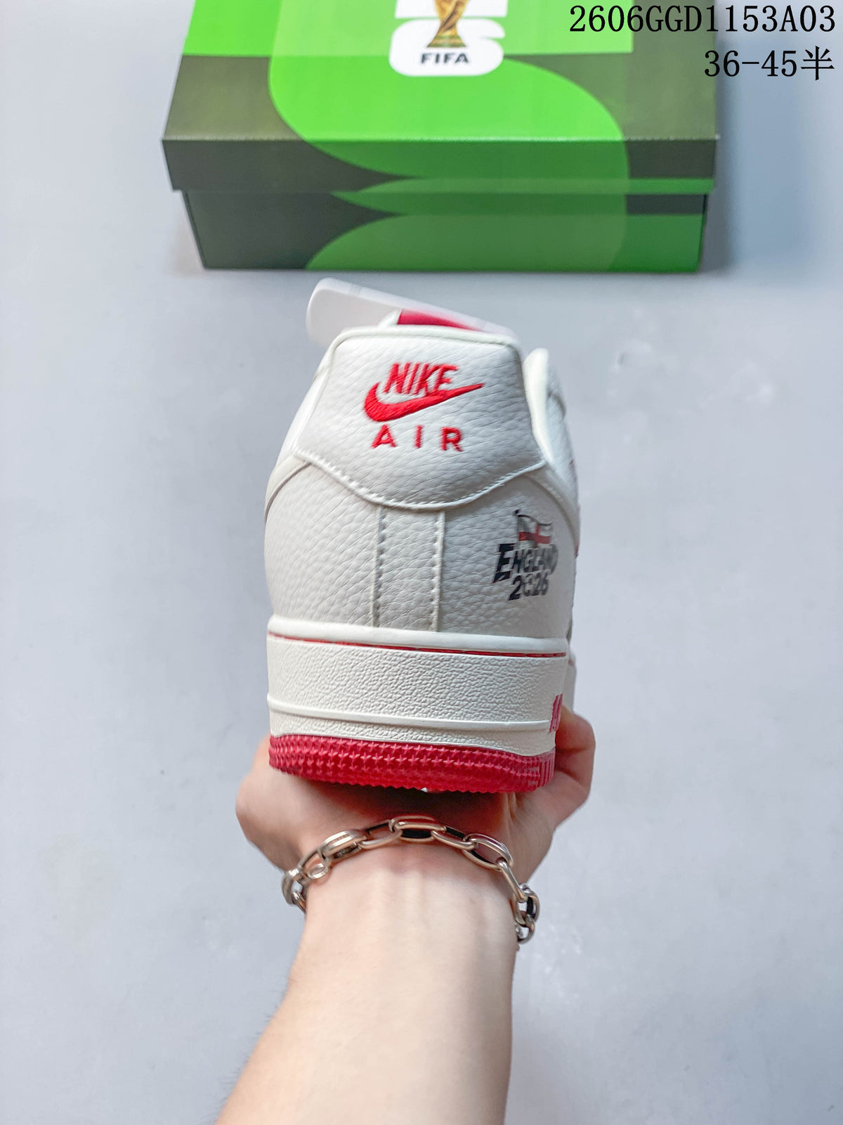 Rear view showing red Nike Air branding and heel graphic.