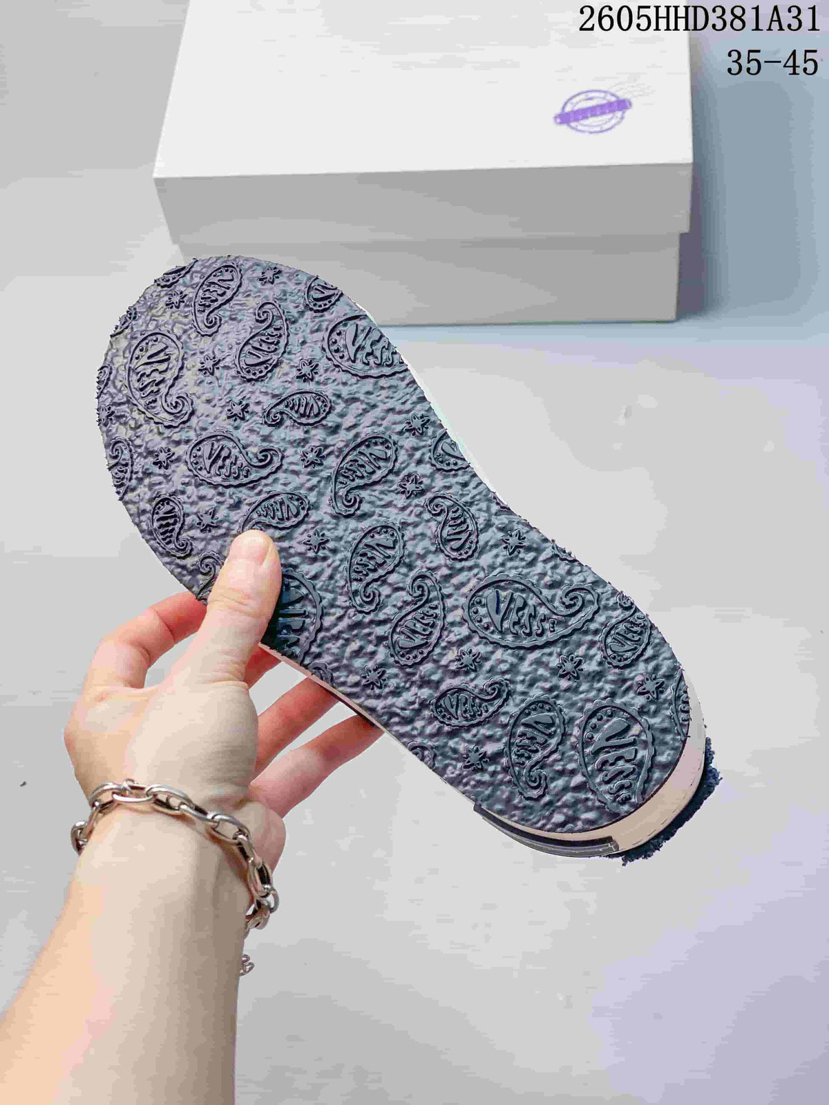 Close-up of the textured outsole with a repeating pattern.