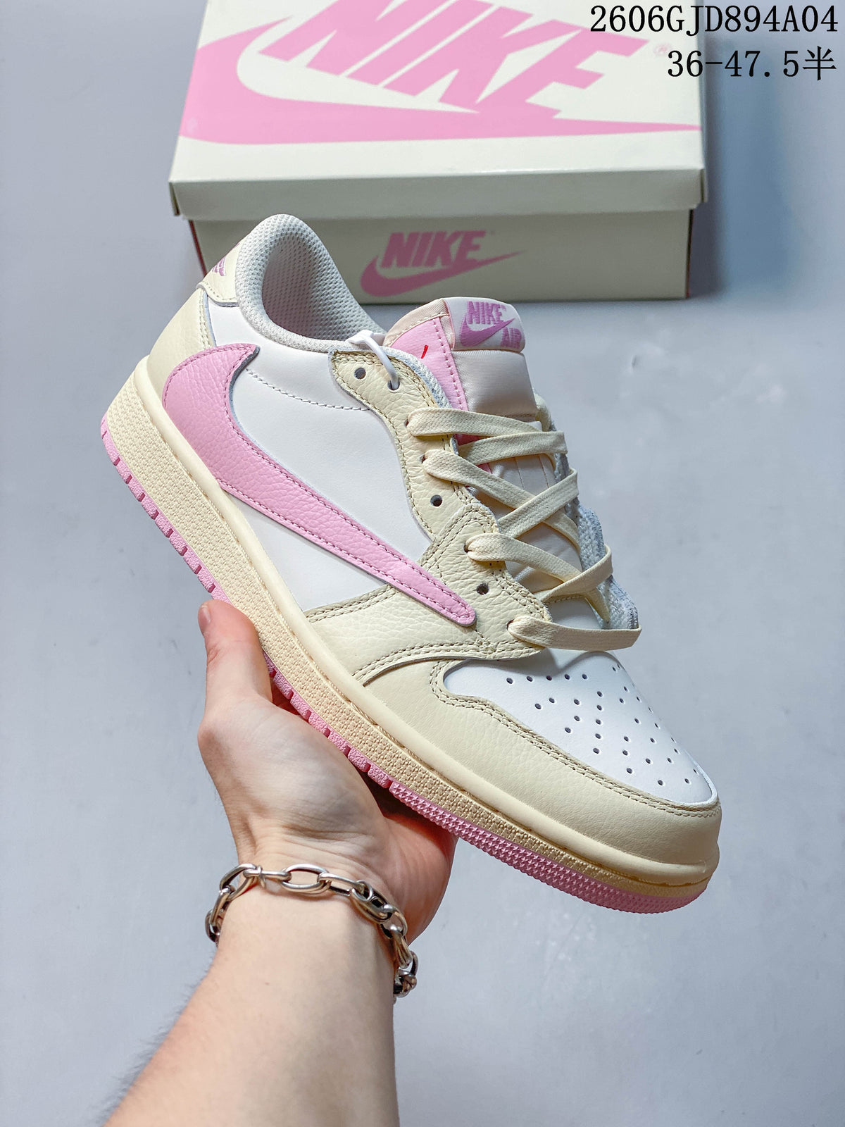 Side view of a cream and white low-top sneaker with a pink Swoosh