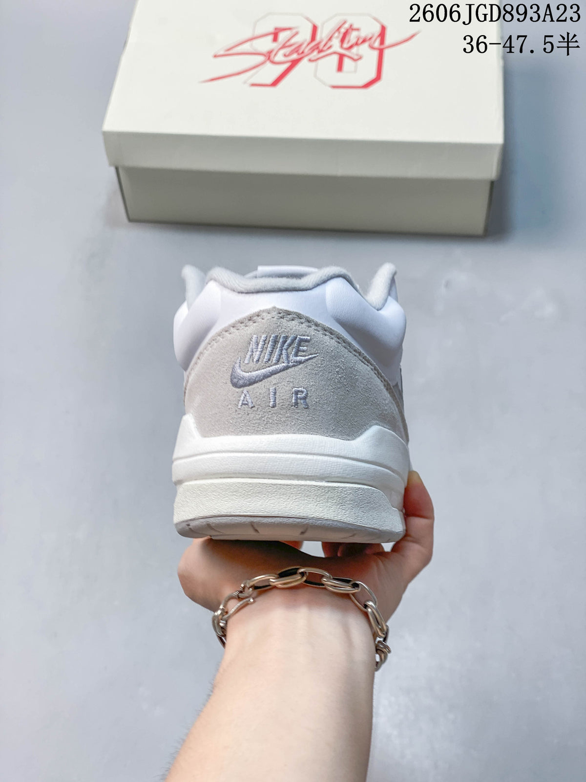Rear view of the sneaker with Nike Air branding on the heel