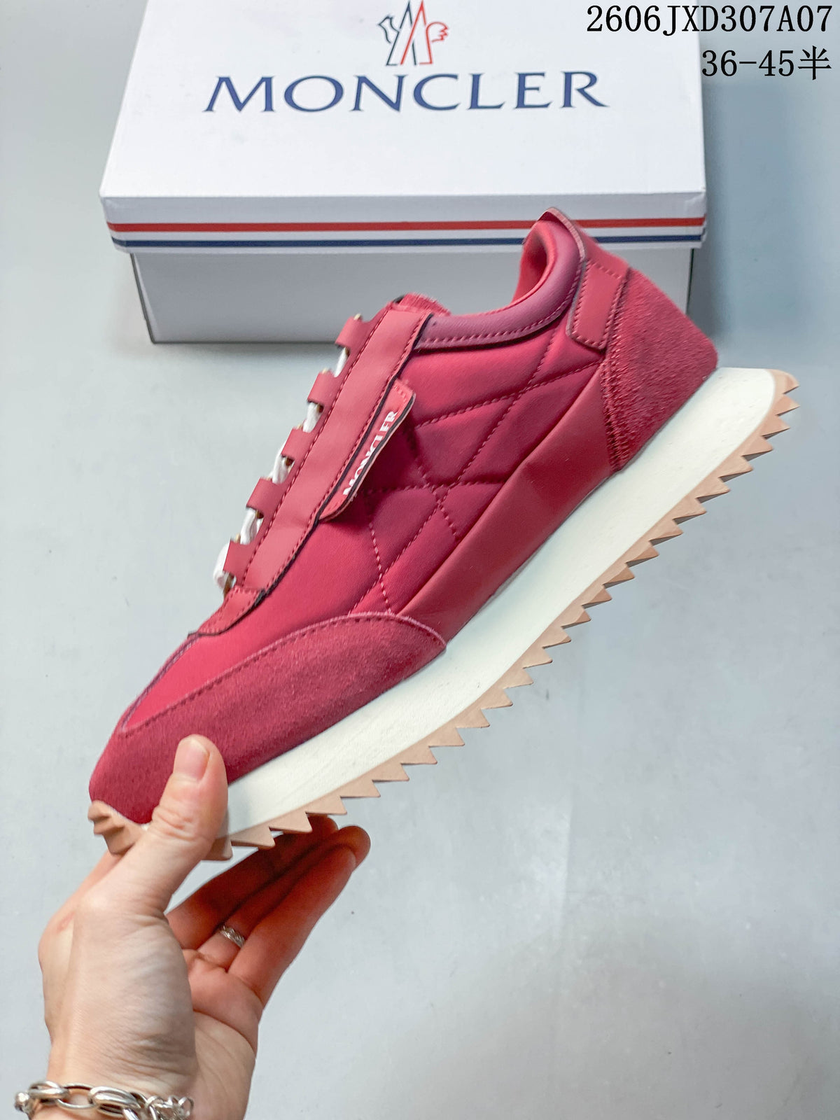 Side view of a rose-pink sneaker with quilted panels, suede-like overlays, and a sawtooth outsole.