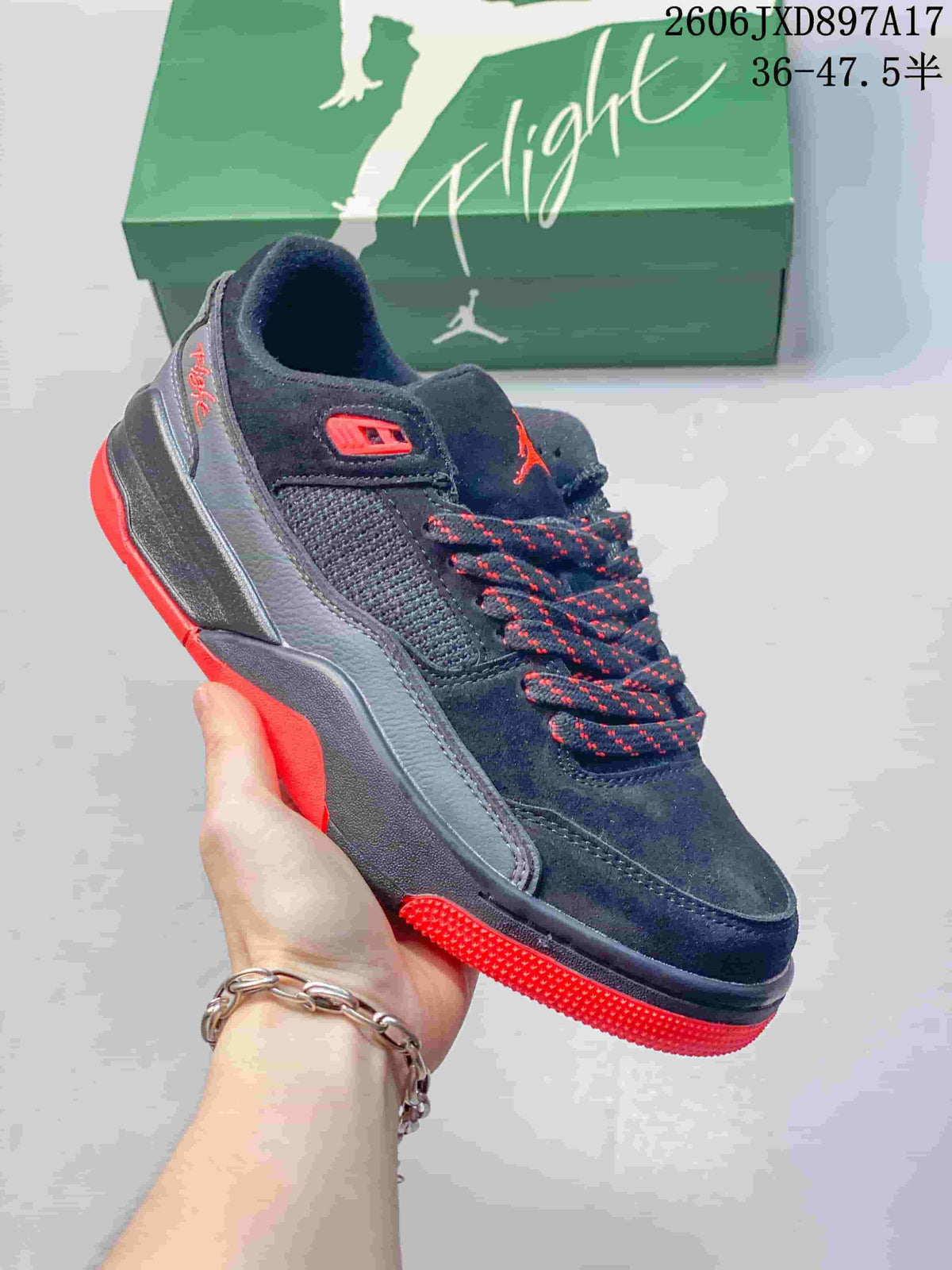 Angled side view of a dark Jordan Flight Court shoe with red accents