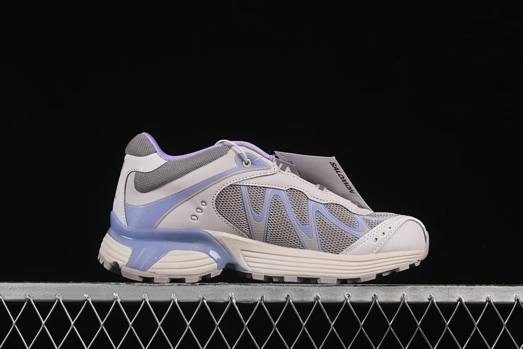Side profile of the Salomon XT-Whisper shoe.