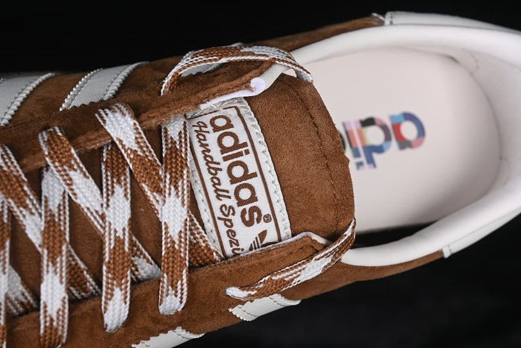 Top detail of the tongue label, laces, and insole