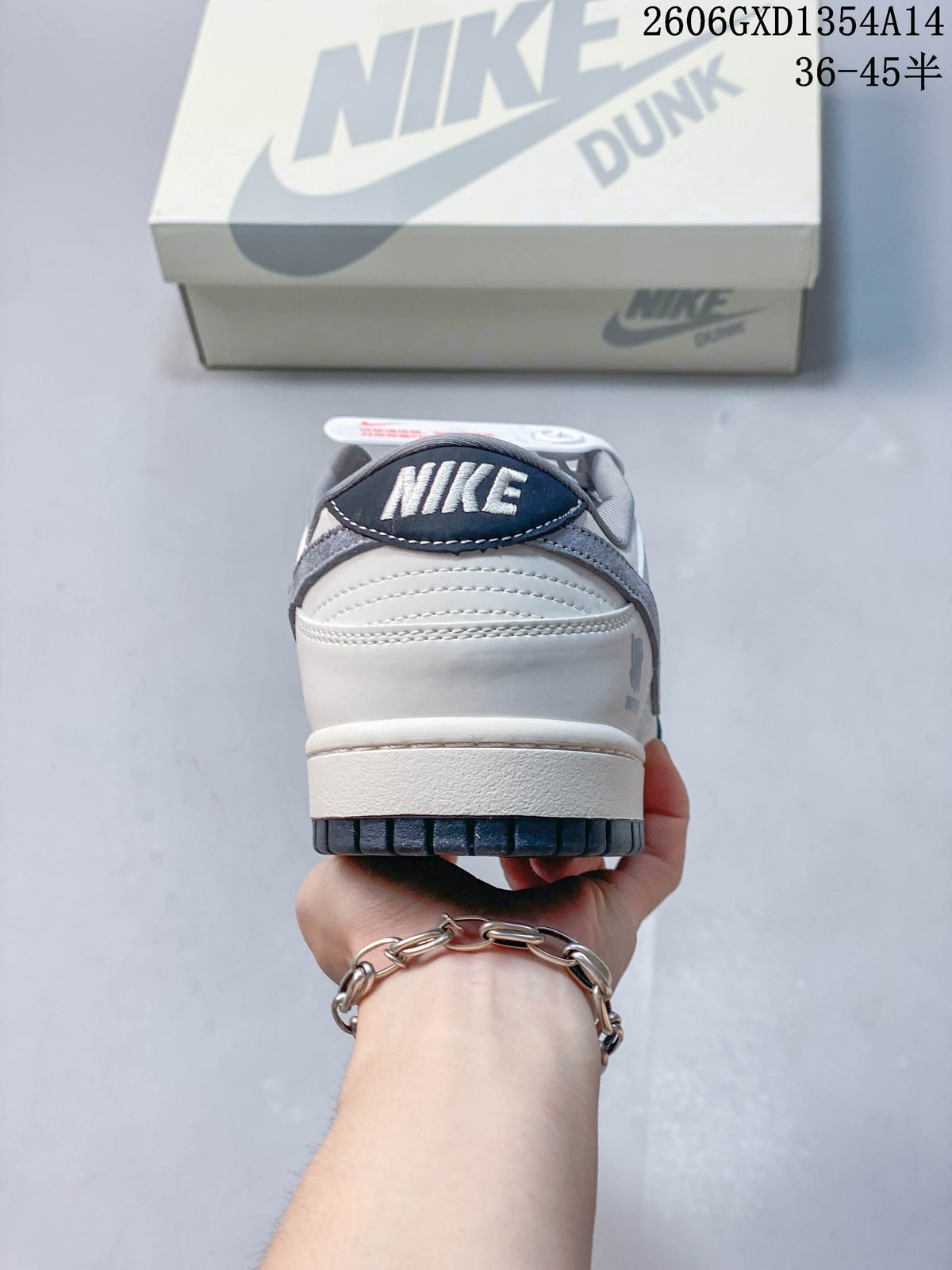 Rear view of the sneaker showing a white heel and navy outsole
