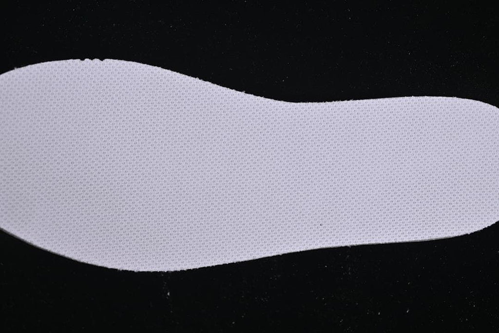Textured white insole viewed from below