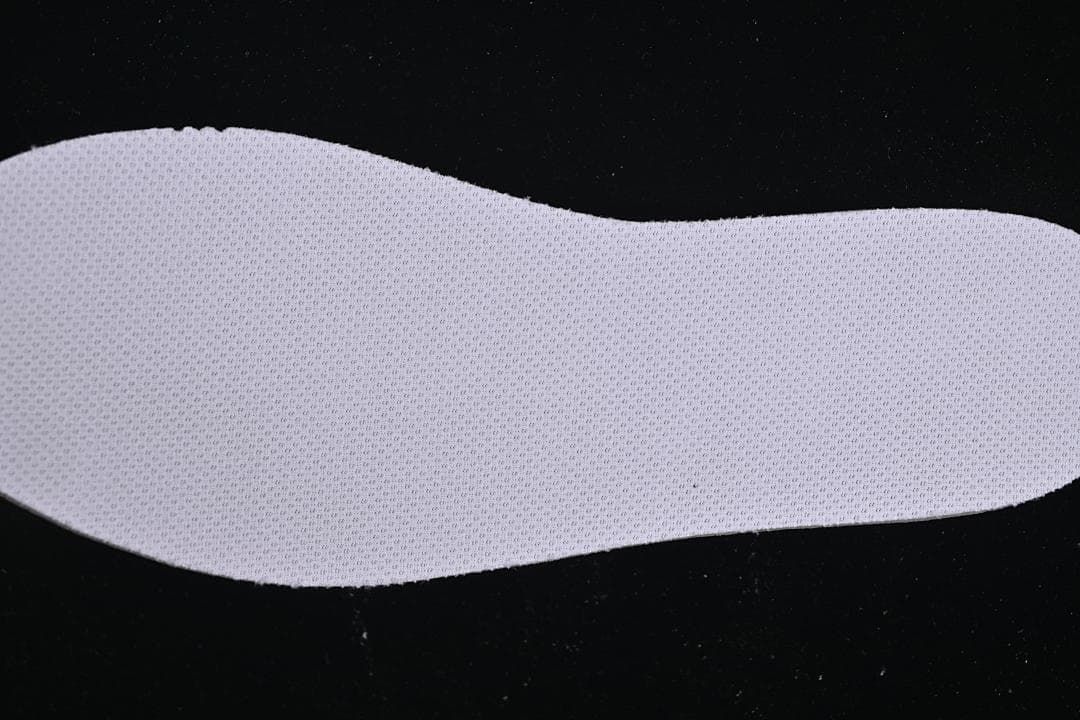 Textured white insole viewed from below
