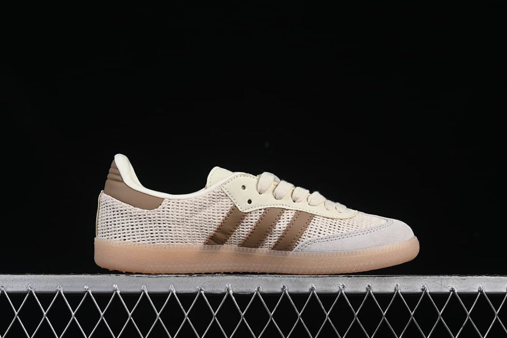 Side profile showing the three brown stripes and gum outsole