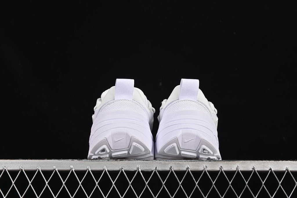 Rear view of the pair showing heel pulls and outsole details