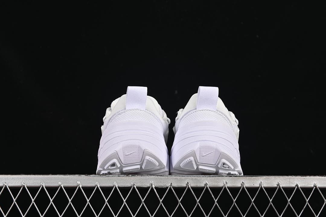 Rear view of the pair showing heel pulls and outsole details