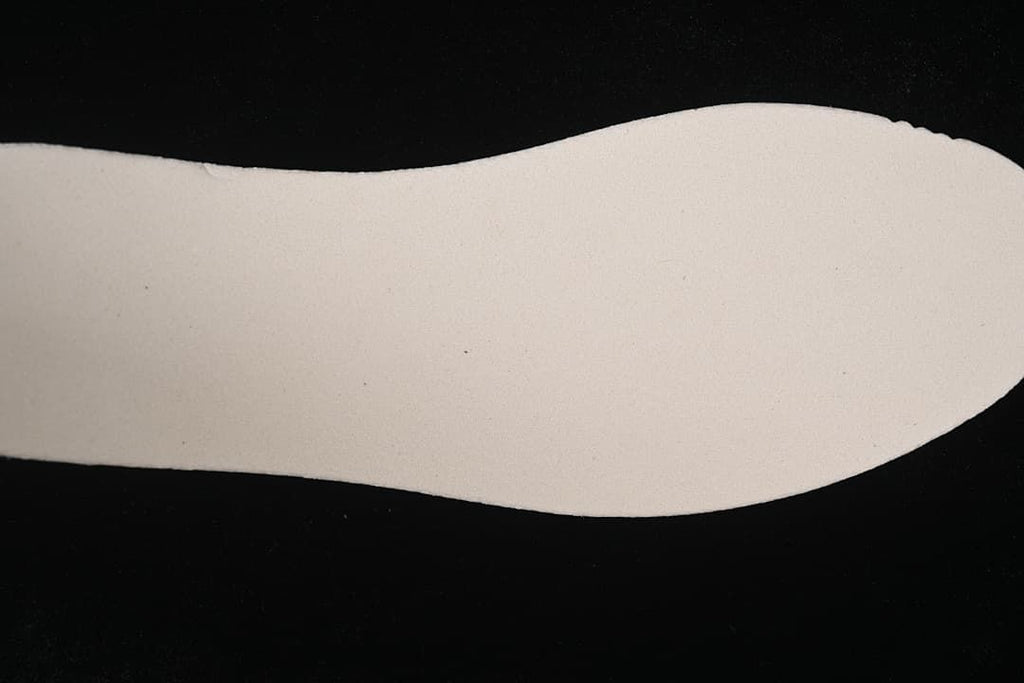 Plain light-colored shoe insert shown separately