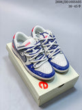 Pair of white, blue, and gray low-top sneakers with multiple lace cords, shown on a branded box