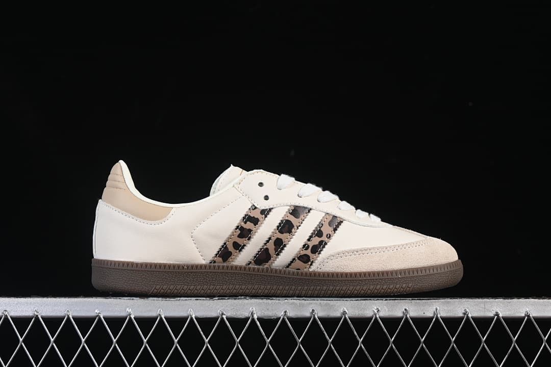 Side profile showing leopard-patterned stripes and a low-profile brown sole