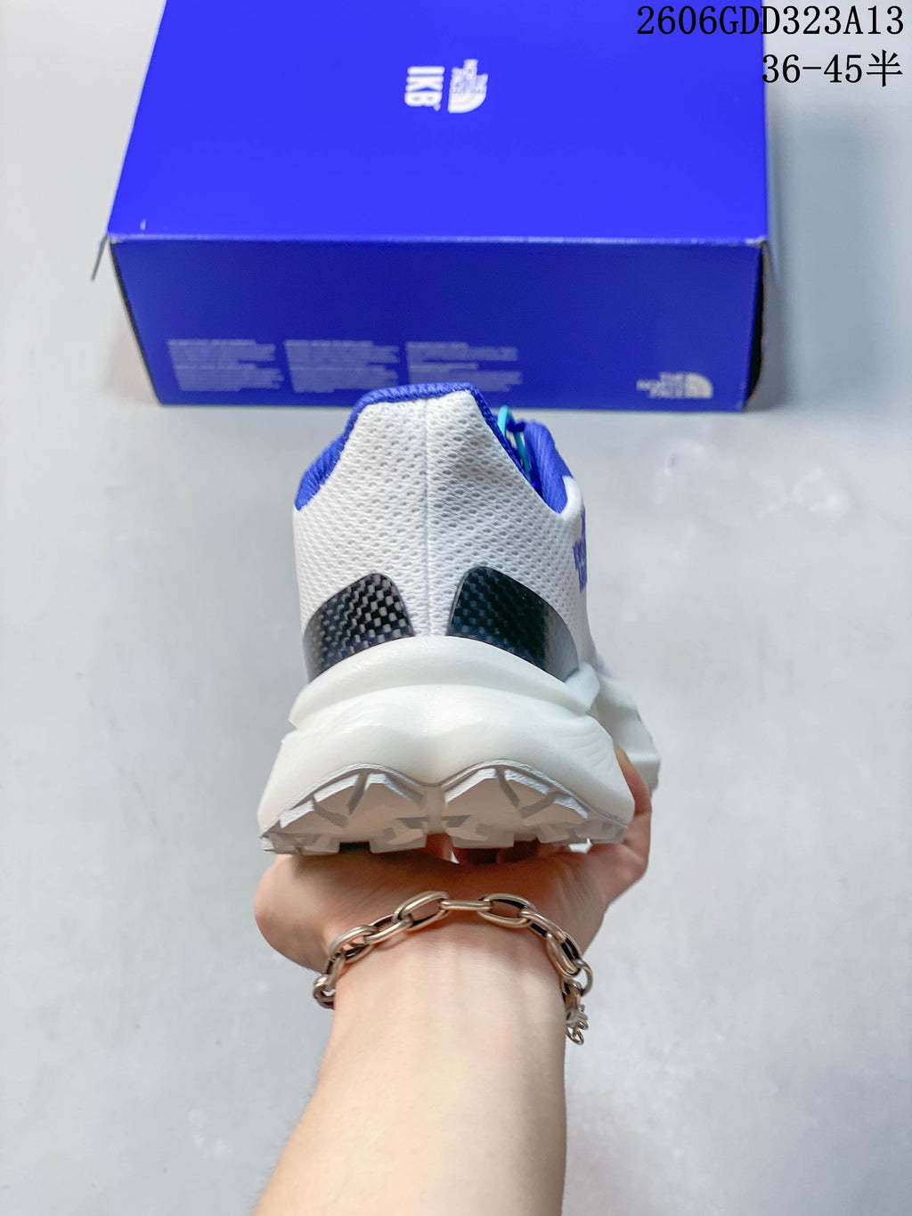 Rear view showing the heel and thick white midsole