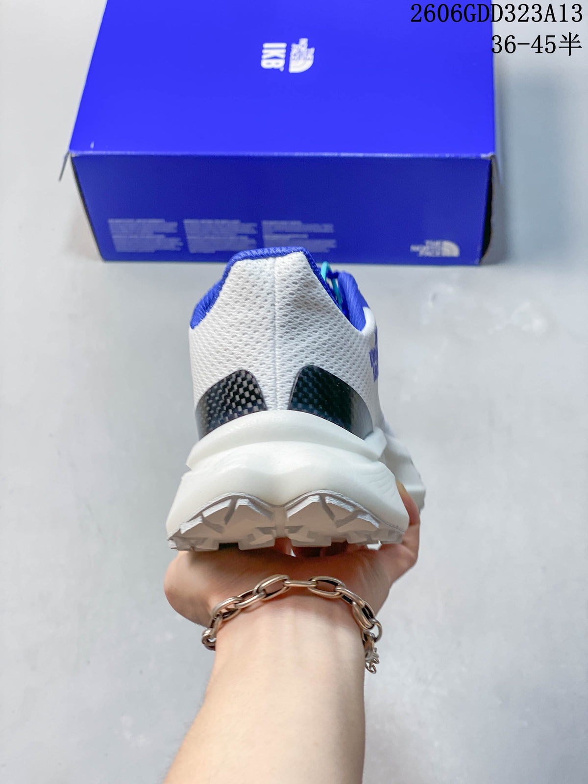 Rear view showing the heel and thick white midsole