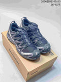 Pair of charcoal gray Salomon XA Pro 3D trail shoes on a Salomon box; image overlay lists sizes 36–45.5.