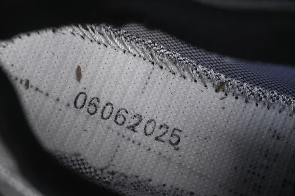 Close-up of the inner shoe lining and printed markings.