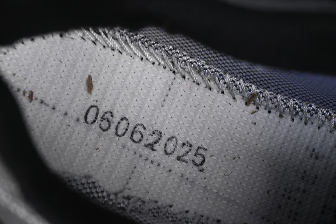 Close-up of the inner shoe lining and printed markings.