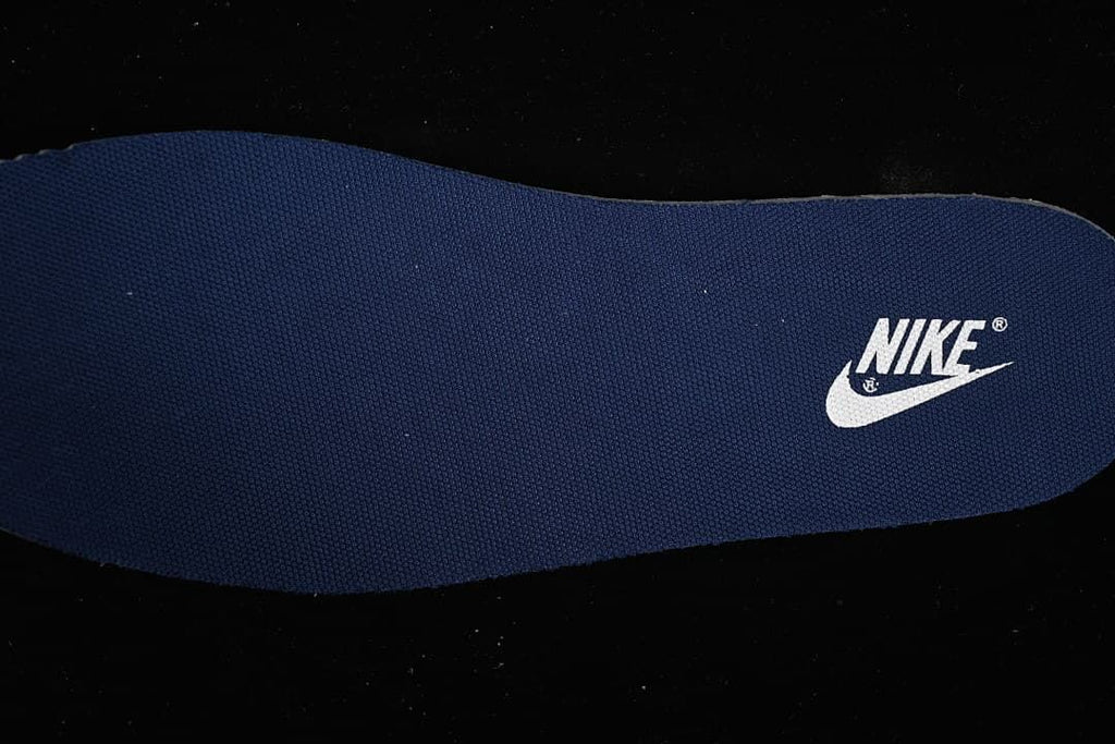 Navy insole with Nike branding
