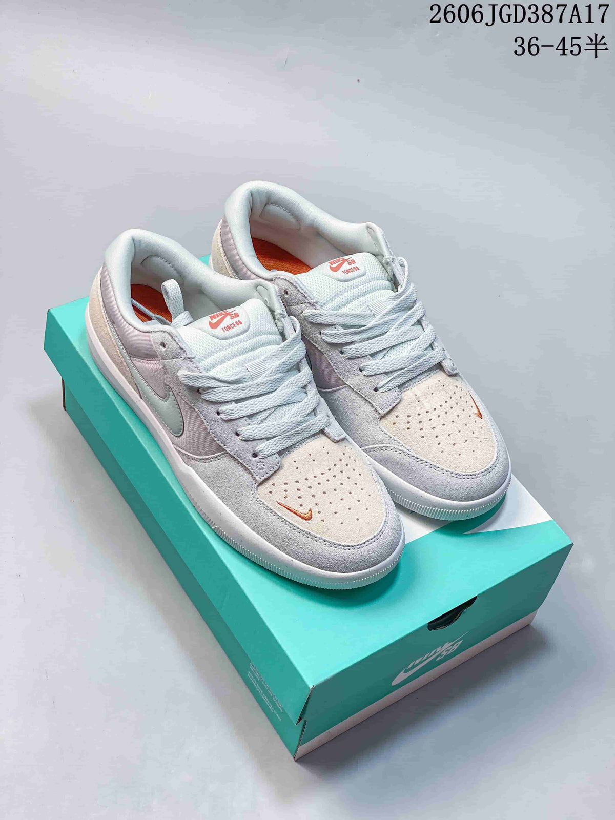 Pair of Nike SB Force 58 sneakers in light gray and off-white with pastel accents, shown on a teal shoebox