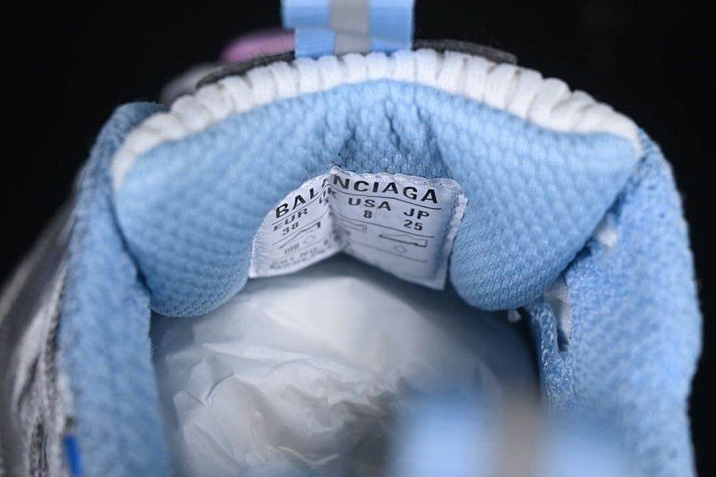Sneaker size label showing EU 38, USA 8 and JP 25
